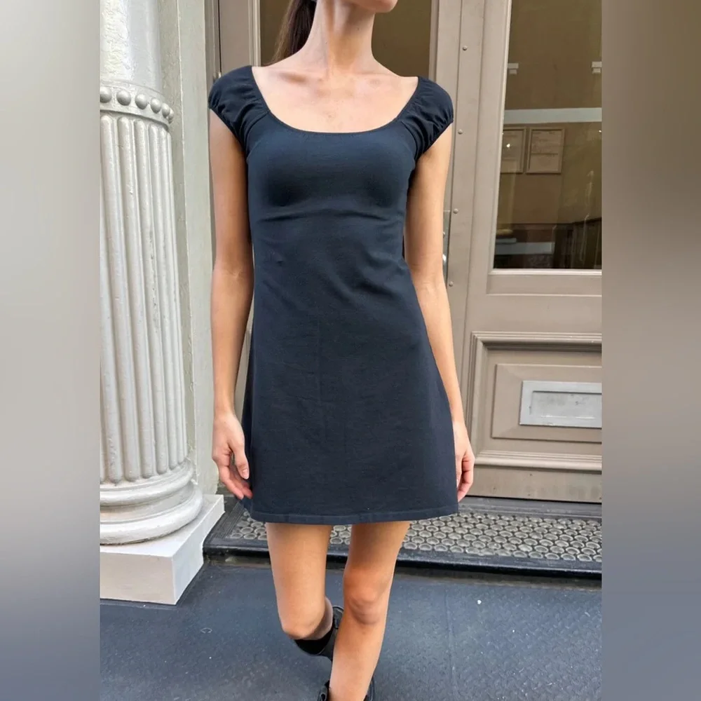 brandy melville dress black Tiffany Polka Dots Brandy Melville Buttoned Dress Black In the softest Italian fabric this versatile mini dress is perfect for Spring and Summer and its so easy to match brandy melville black kyran mini
